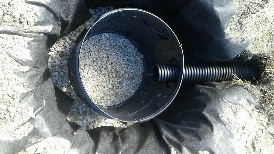 Overhead open drywell basin gravel bottom corrugated inlet pipe, Lake Mary